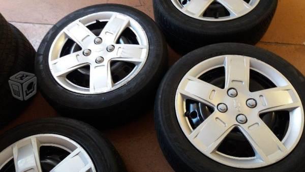 Rines 15 4x100 con tapones y llantas