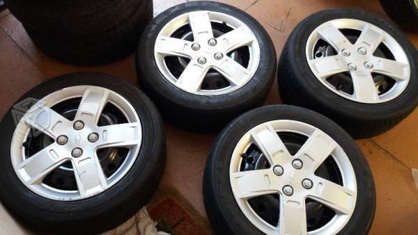 Rines 15 4x100 con llantas aveo