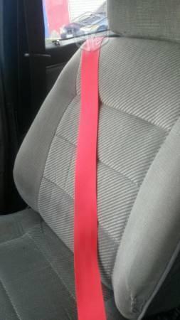 Cinturones rojo de seguridad