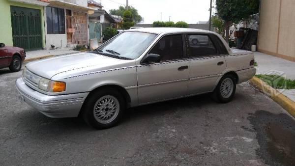 Excelente ford ghia 6cil automatico en piel -94