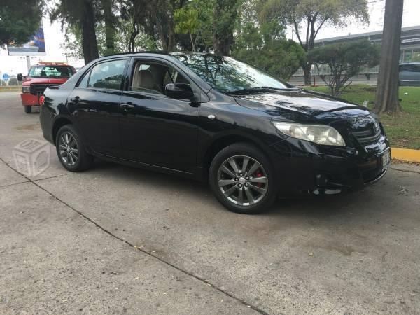 Toyota corolla std todo pagado rines -09