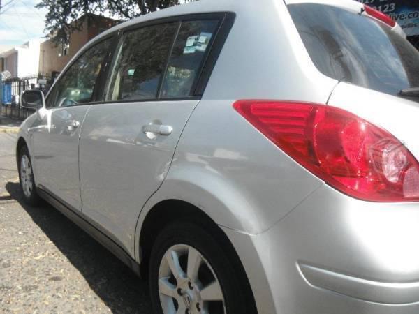 Tiida equipado, muy entero, -07