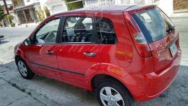 Ford Fiesta impecable -06