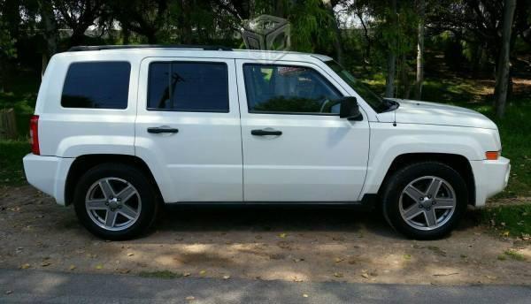 Jeep Patriot sport llantas nuevas asegurada -08