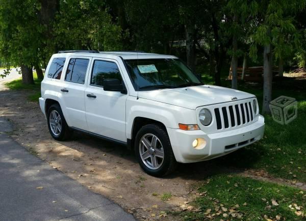 Jeep Patriot sport llantas nuevas asegurada -08