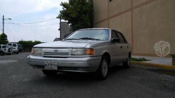 Ford topaz ghia equipado en piel 6cil automatico -94