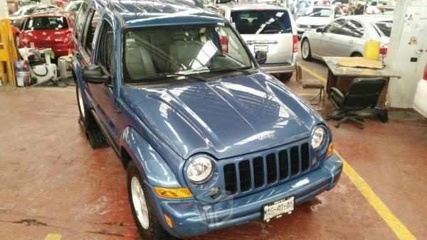 Jeep Liberty piel factura original -06