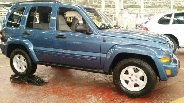 Jeep Liberty piel factura original -06