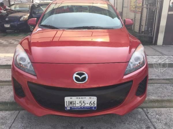 Mazda 3 rojo metálico int. negros trans. manual
