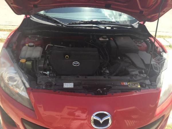 Mazda 3 rojo metálico int. negros trans. manual